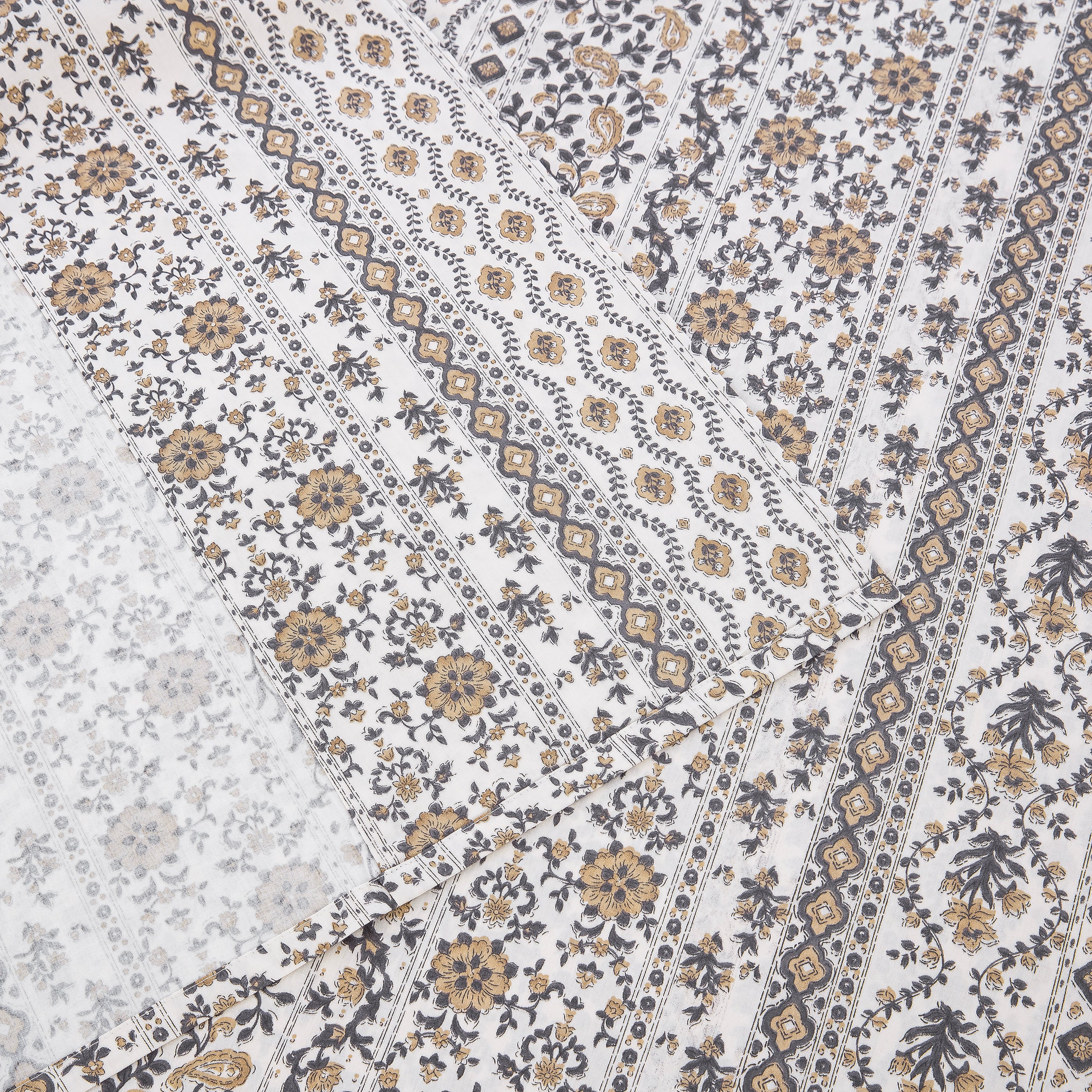 Detailed view of the intricate border pattern and neat hem on the DAUAOTO vintage block print lightweight cotton flat sheet.