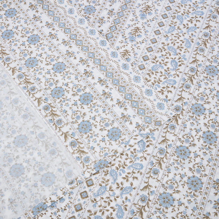 Detailed view of the intricate border pattern and neat hem on the DAUAOTO coastal blue block print lightweight cotton flat sheet.