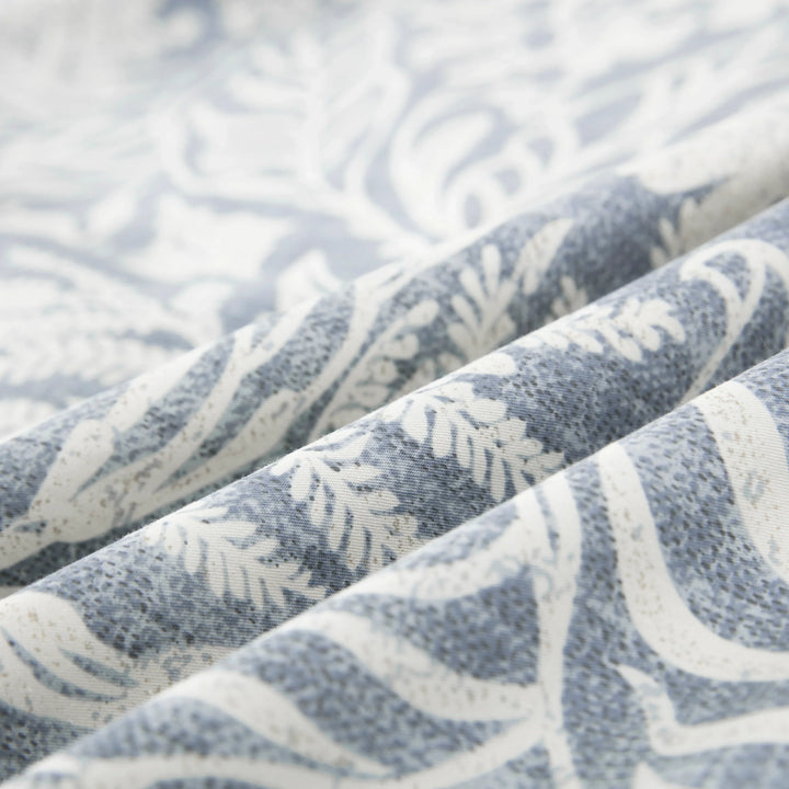 Close-up of the ultra-soft 100% pure cotton fabric showing the bluish-gray and soft white botanical print - DAUAOTO