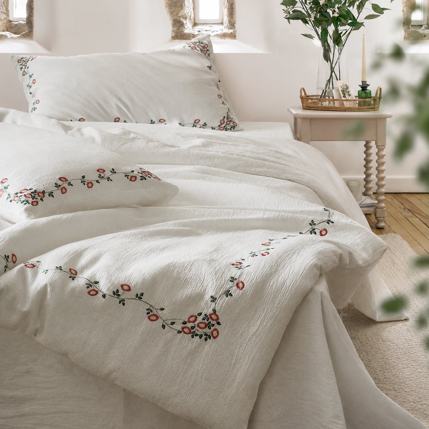 Briar Bloom embroidered washed cotton duvet cover set styled in a bright neutral bedroom