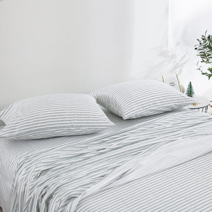 Casual farmhouse aesthetic bedroom styled with the versatile soft blue hand-painted stripe cotton sheets - DAUAOTO