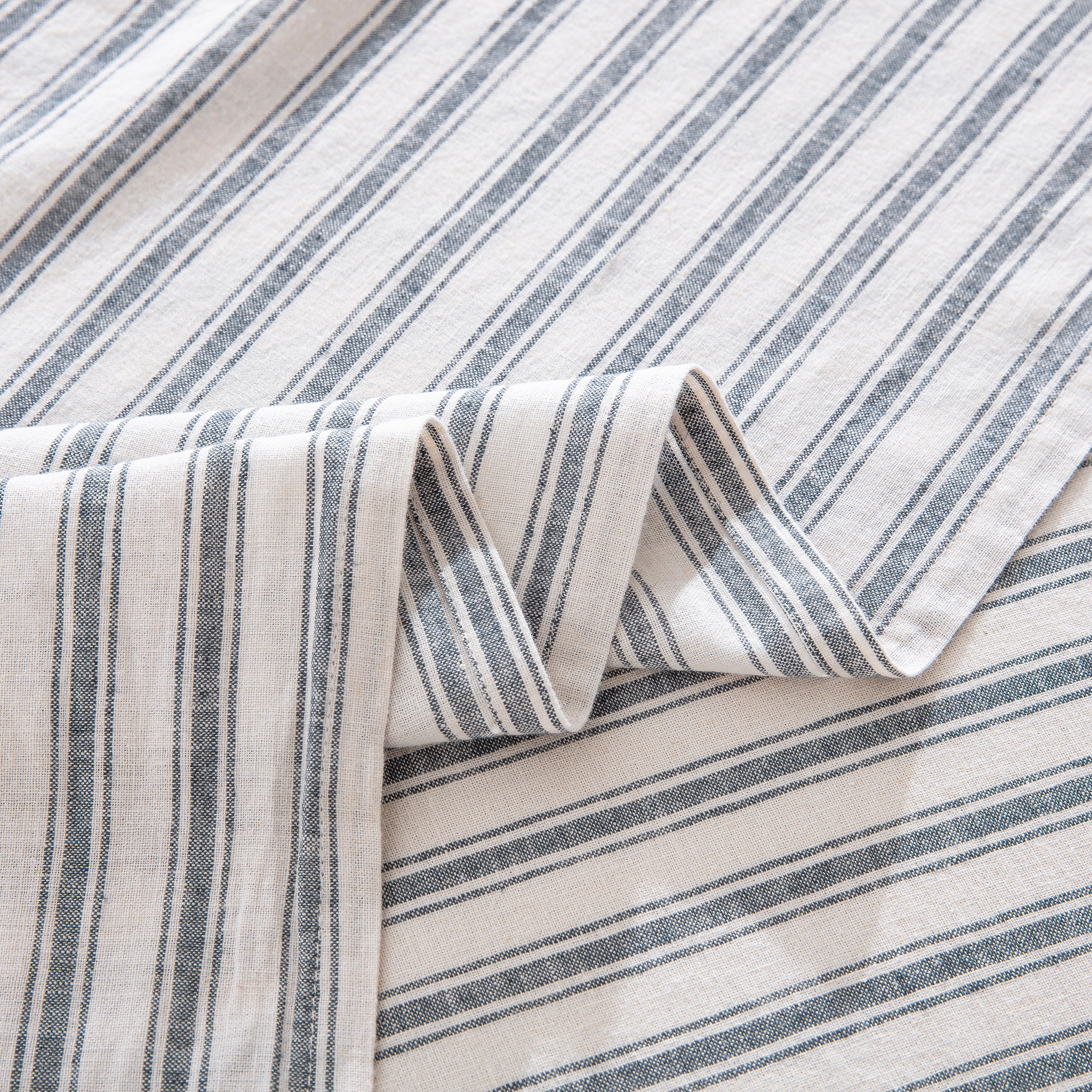 Detailed view of the prewashed classic grey striped flat sheet highlighting the rustic farmhouse charm and smooth softness - DAUAOTO