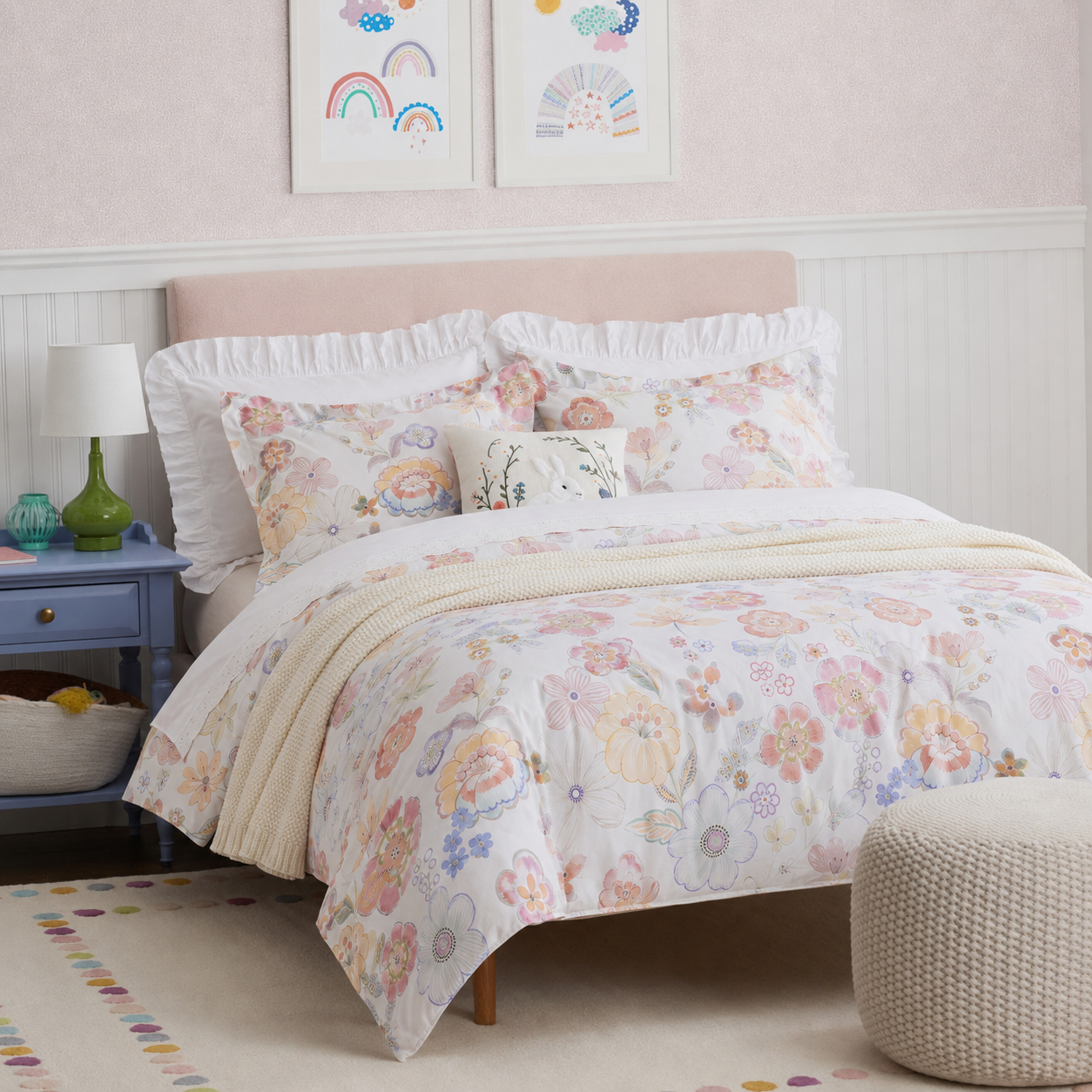 Angled view of a bright, inviting bedroom featuring the DAUAOTO pastel blossom floral cotton bedding.