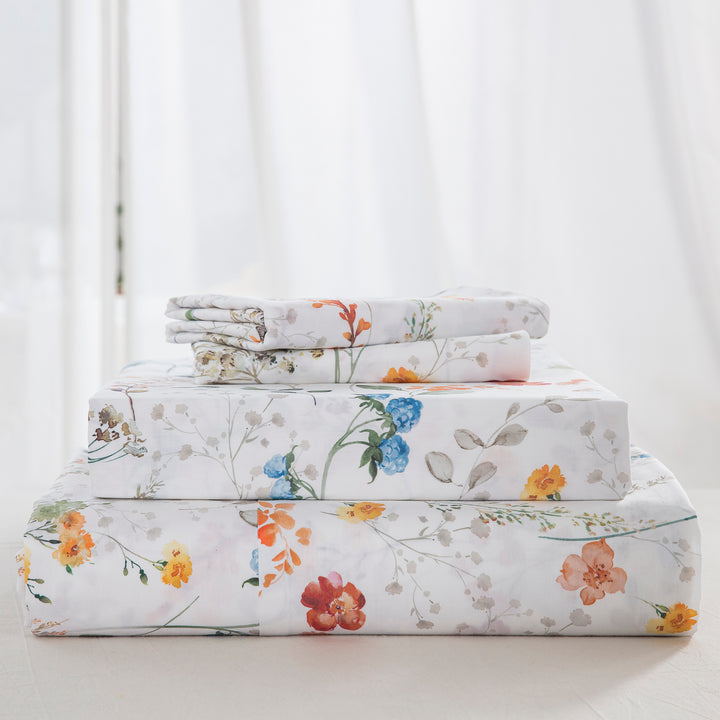 Complete pure cotton bedding ensemble neatly folded including an elegant flat sheet, tailored fitted sheet, and matching pillowcases - DAUAOTO