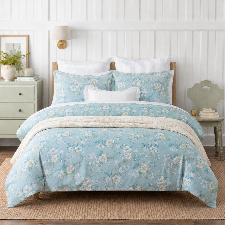 Front view of a calming bedroom featuring DAUAOTO lightweight light blue floral duvet cover and matching pillowcases.