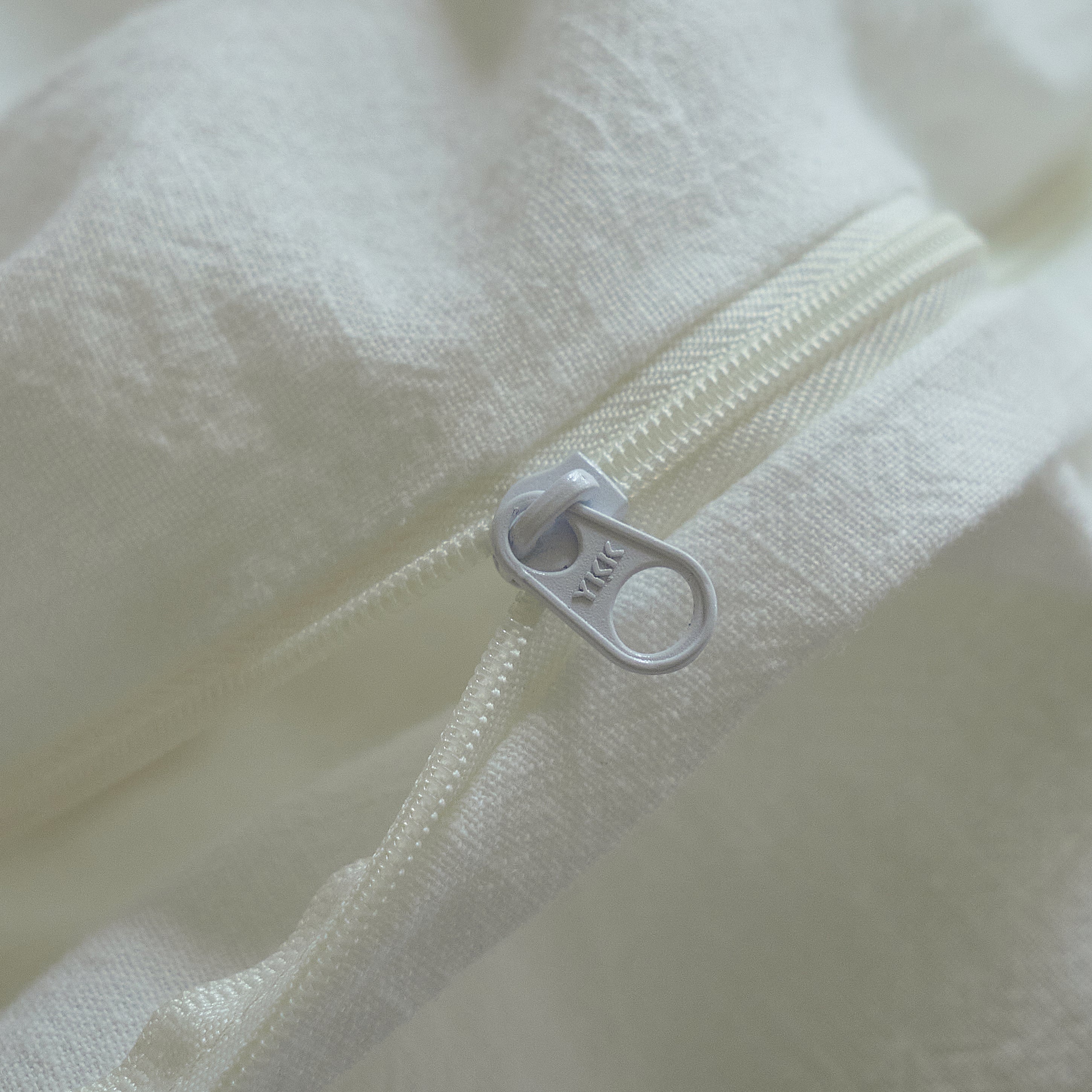 Concealed zipper closure on the Morning Meadow white cotton duvet cover.