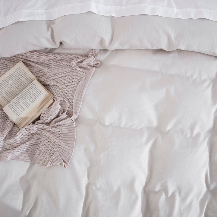 Relaxed luxury layering with dove grey prewashed bedding and a textured throw blanket for cozy comfort - DAUAOTO