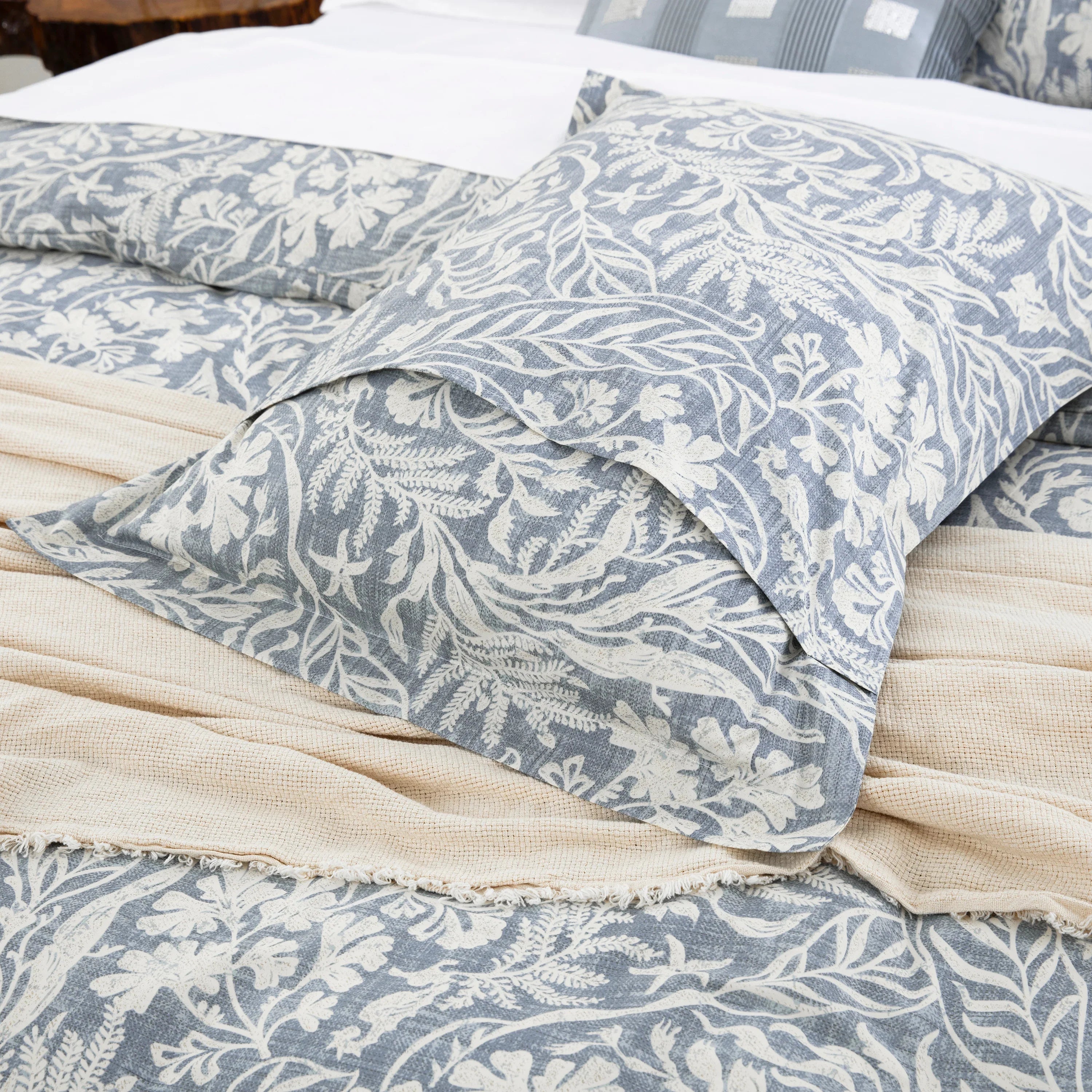 Matching 100% pure cotton pillow shams showcasing the vintage-inspired dusty blue botanical pattern - DAUAOTO