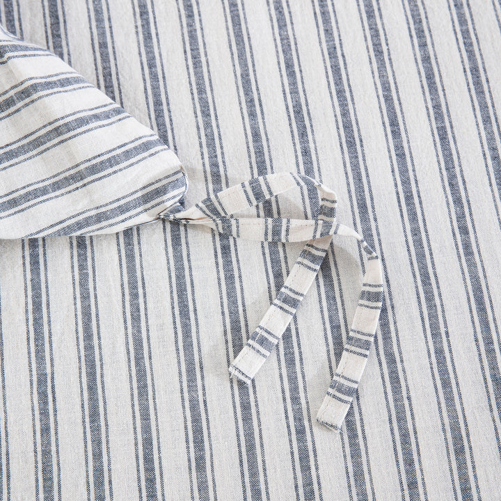 Four durable interior corner ties ensuring a secure and snug fit for the striped linen duvet insert - DAUAOTO