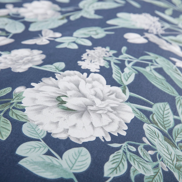 Close-up of classic vintage botanical flower print on rich navy blue cotton duvet cover - DAUAOTO