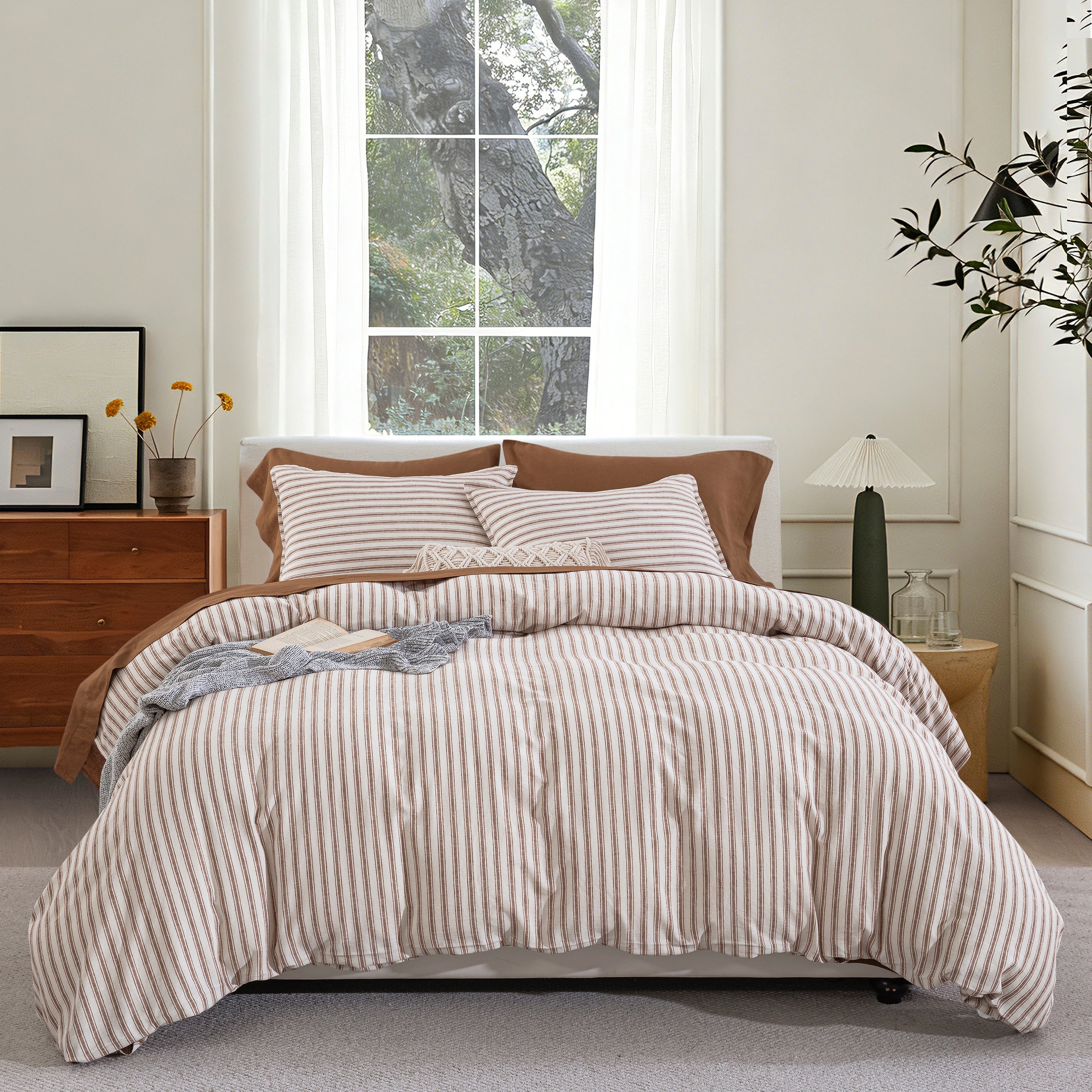 Relaxed luxury layering with the tactile lived-in texture of caramel yarn-dyed stripe linen bedding - DAUAOTO