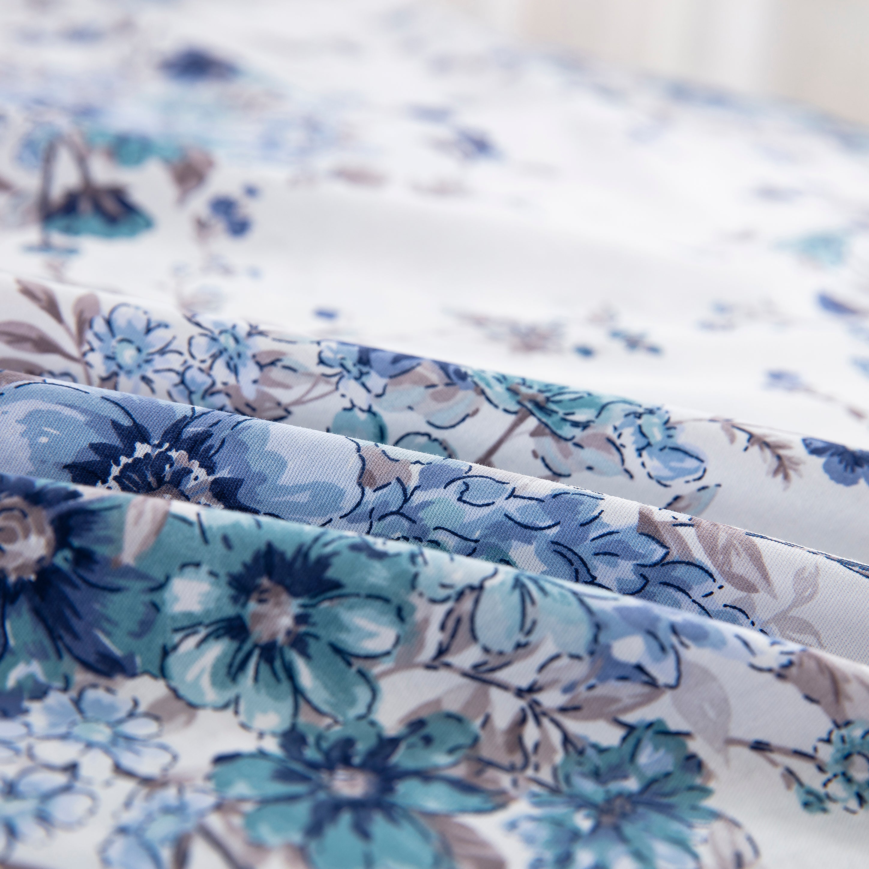 Close-up of the ultra-soft 100% natural cotton fabric in soothing shades of blue vintage chintz floral - DAUAOTO
