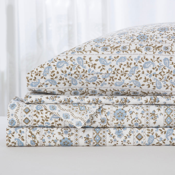Neatly folded and stacked DAUAOTO coastal blue block print 100% cotton sheet set, showcasing the flat sheet, fitted sheet, and pillowcases.