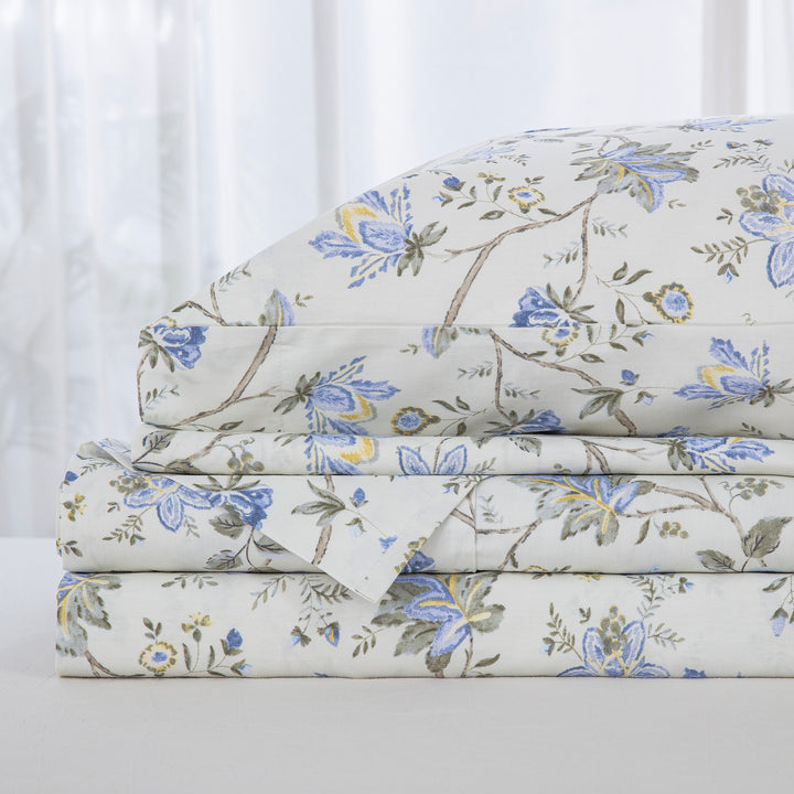 Neatly folded and stacked DAUAOTO Provence blue botanical 100% cotton sheet set, showcasing the flat sheet, fitted sheet, and pillowcases.