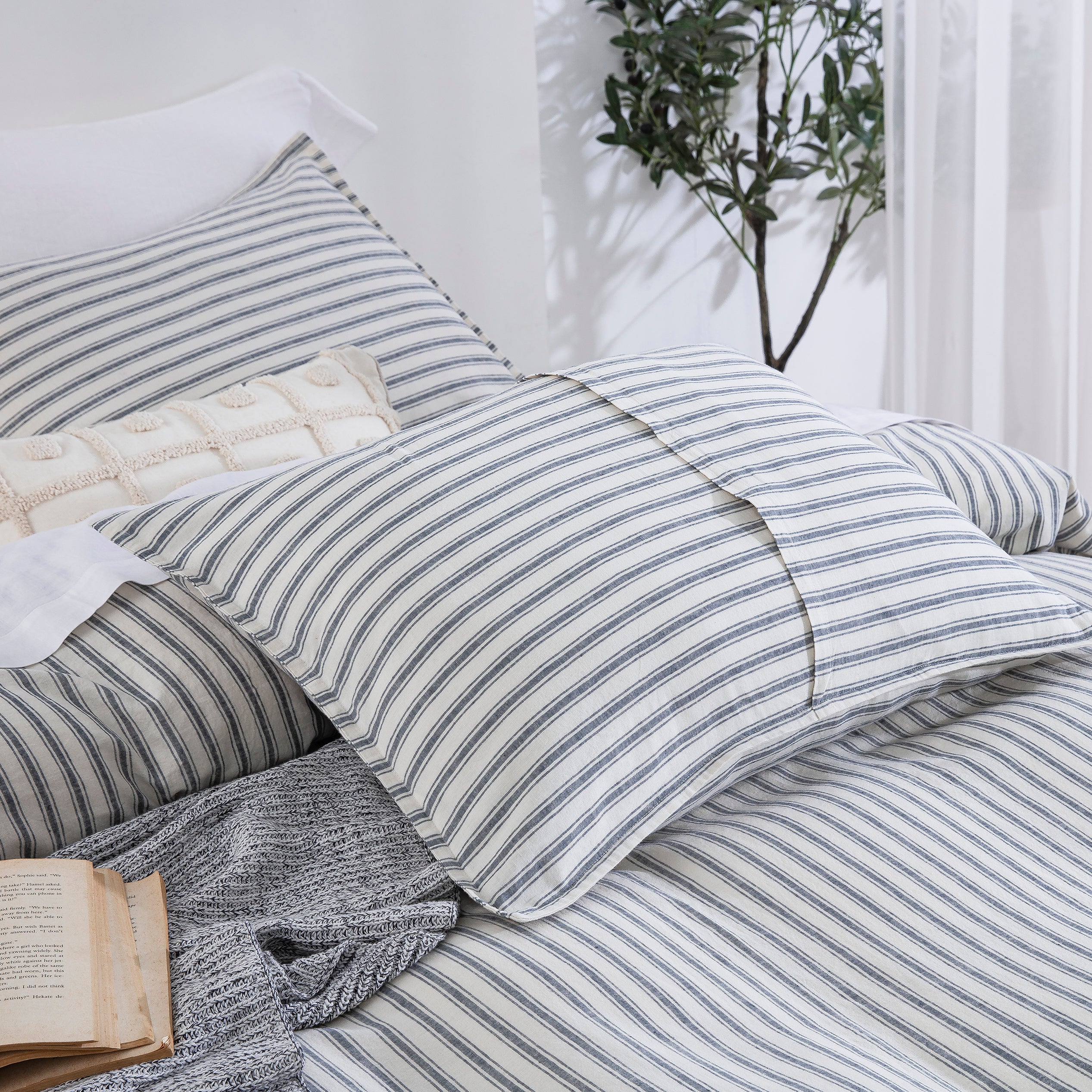 Coordinating tailored stripe linen cotton pillow shams with sleek envelope closures - DAUAOTO