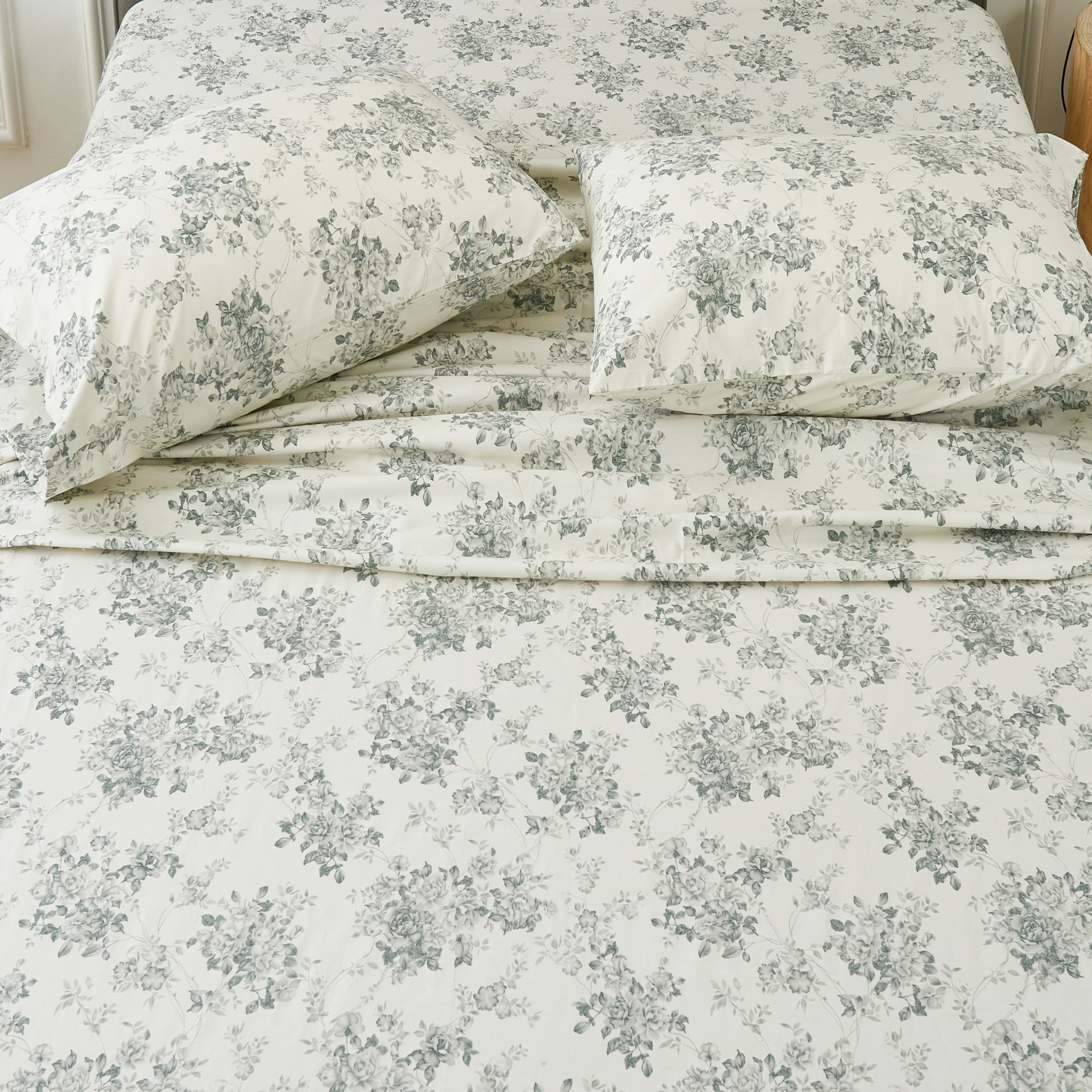 Top-down view of the serene monochromatic pale black rose pattern pure cotton bed sheets - DAUAOTO