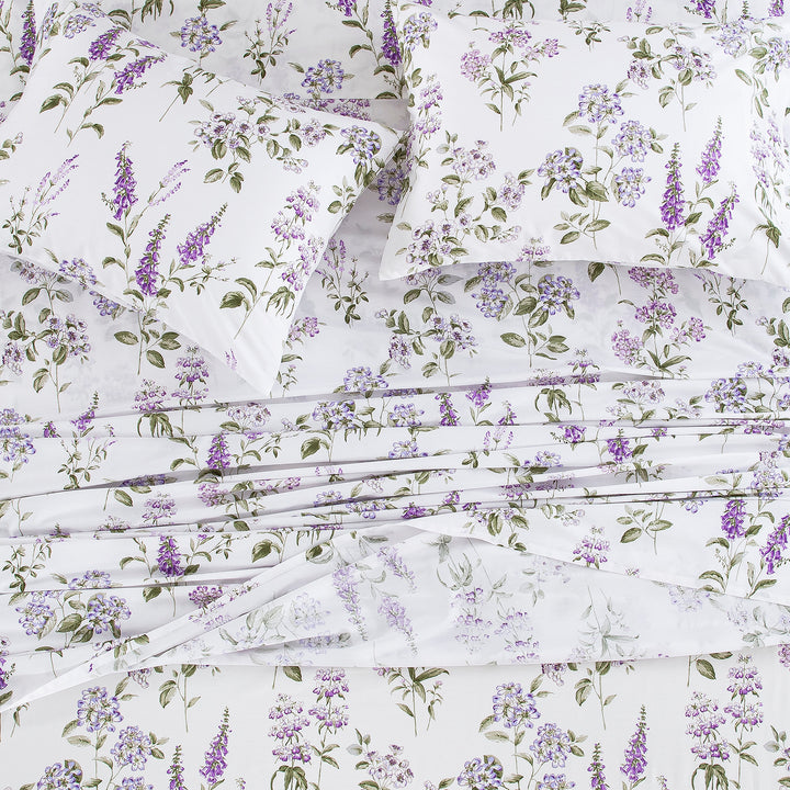 Top-down view of the romantic oasis master suite styled with the watercolor-inspired purple floral pure cotton bed sheets - DAUAOTO