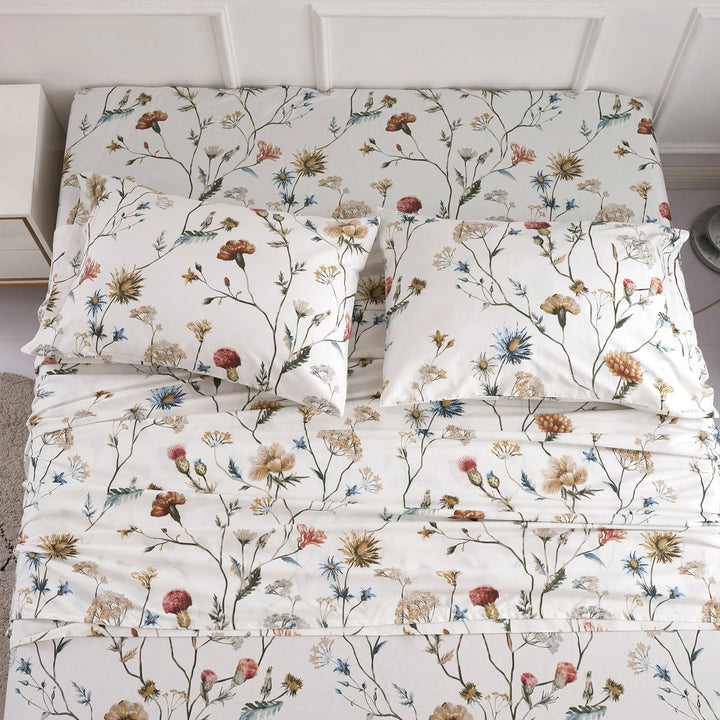 Top-down view of the cottagecore warmth multi-colored floral garden print pure cotton bed sheets - DAUAOTO