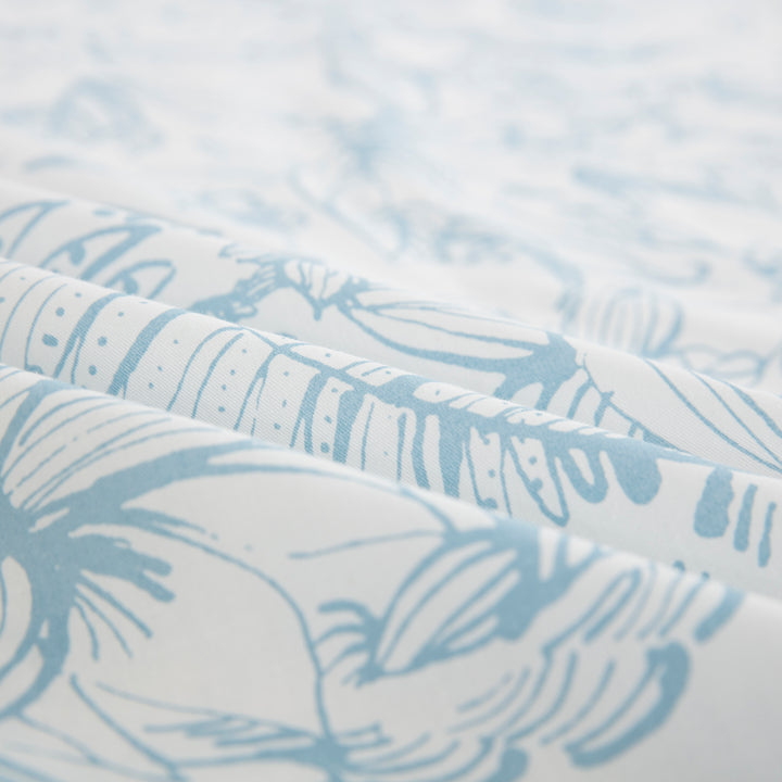 Close-up of the ultra-soft 100% pure natural cotton fabric featuring a breathable light blue floral vine - DAUAOTO
