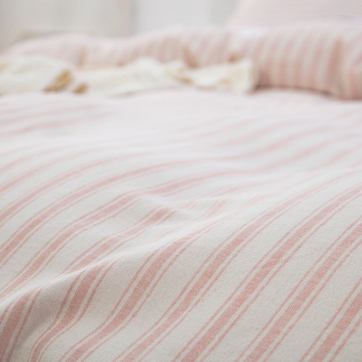 Close-up of the yarn-dyed blush pink stripe pattern showing rich color depth and tactile texture - DAUAOTO