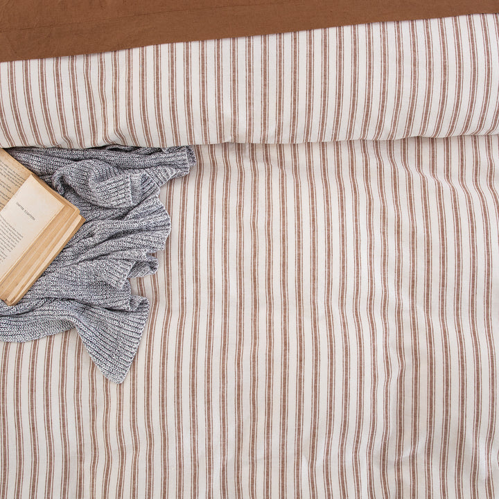Close-up of the classic ticking stripe pattern woven from yarn-dyed fibers for exceptional color depth - DAUAOTO